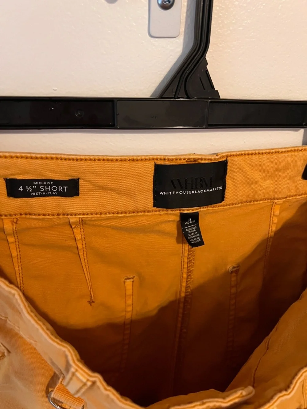 White House Black Market 4 ½” mid rise shorts - Yellow - Size 4